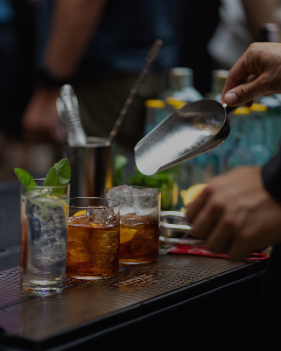 Cocktails being prepared at the bar