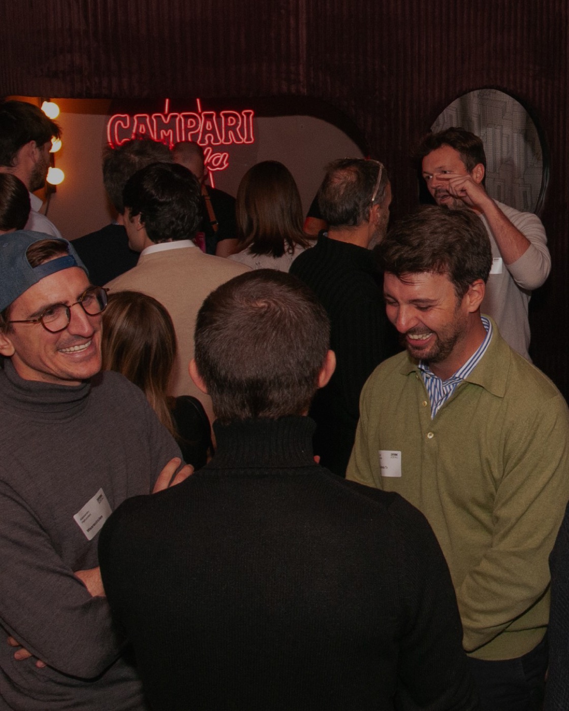 Guests by the Campari neon